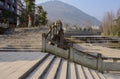 Riverside balustraded stone stair outside small town