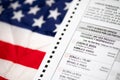 Riverside, California, USA - 10/2020: Blank Official Ballot On American Flag in the 2020 Presidential Election