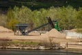 Riverside gravel plant Royalty Free Stock Photo