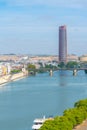 Riverside of Guadalquivir with Torre Sevilla in Spain