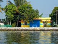 Riverside homes Alleppey Kerala houseboats Alappuzha Laccadive Sea southern Indian state of Kerala known for wooden house boats Royalty Free Stock Photo