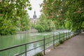 Riverside of isar river munich, with blooming red chestnut trees Royalty Free Stock Photo