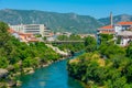 Riverside of Neretva at the old town of Mostar, Bosnia and Herze Royalty Free Stock Photo