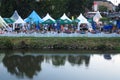 Riverside open-air pub by twilight