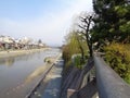 Riverside, a pedestrian walk between river and greenery