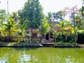 Riverside resorts homes in Alleppey Kerala houseboats Alappuzha Laccadive Sea southern Indian state of Kerala known wooden boats