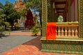 A riverside temple of Kampot, Cambodia with monks robe