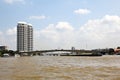 Riverside view. Bridge over River, Bangkok.