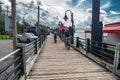 Riverwalk along the waterfront of the Cape Fear River on bike overlooking Memorial Bridge Wilmington, NC Royalty Free Stock Photo