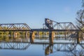 Riverwalk Old functioning train bridge over the Savannah river reflection in the water Royalty Free Stock Photo