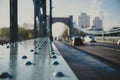 Rivet as a detail of an old suspension bridge and city road in perspective Royalty Free Stock Photo