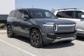 Rivian R1S EV Electric Vehicle display at a dealership. Rivian offers the R1S in Adventure and Launch models
