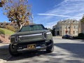 Rivian R1T all-electric, battery-powered, light duty pickup truck parked on the resedential street. Front view - San Francisco,