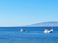 Riviera blue seascape and coastal nature concept. Sea, yachts and mountains in the morning