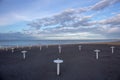 Riviera Romagnola beach near Rimini and Riccione, with typical umbrella supports; nobody; desolation mood Royalty Free Stock Photo