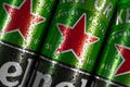 RIVNE  UKRAINE - JANUARY 12  2021: Heineken beer cans close up. Heineken Dutch brewing company. Heineken beer global brand Royalty Free Stock Photo