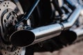 Rivne, Ukraine - September 23, 2019: Harley-Davidson Fat Boy motorcycle detail.  Motorcycle engine exhaust pipes. Royalty Free Stock Photo