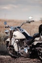 Rivne, Ukraine - September 23, 2019: Harley-Davidson Fat Boy motorcycle detail. Motorcycle at the old town road field. Royalty Free Stock Photo