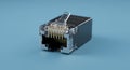 RJ45 Ethernet connector on a light blue background. The rectangular plug features Royalty Free Stock Photo
