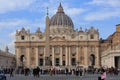 St Peter\'s Basilica with many people queuing to gain entry