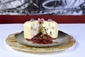 Mozzarella cheese stuffed with nuts cut in half with strawberry jam Royalty Free Stock Photo