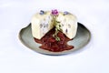 Mozzarella cheese stuffed with nuts cut in half with strawberry jam Royalty Free Stock Photo