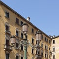 An rnate lampost and building in the backround Royalty Free Stock Photo