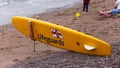 RNLI Lifeguards surfboard on the beach at Torquay English Riviera Devon England UK May 29 2021