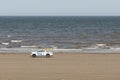 RNLI pick up truck patrolling the beach