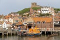 RNLI Whitby Lifeboat Station in Whitby, North Yorkshire, UK, with the lifeboat moored outside Royalty Free Stock Photo