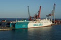 Ro-Ro, passenger ship operated by the Spanish company BALEARIA moored in Barcelona during loading cars and lories.