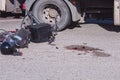 Road accident. Blood stains and crushed bicycle near the truck traffic concept, road safety