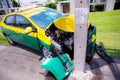 Road accident car crash on an city road.Close the front car collided with a power pole accident so severe that demolished due to d Royalty Free Stock Photo