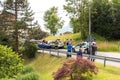 Road accident and rescue workers tending to car accident victim.