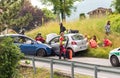 Road accident and rescue workers tending to car accident victim.