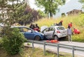 Road accident and rescue workers tending to car accident victim.