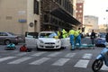 Road accident, rescuers take the injured person out of the car