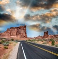 Road across Arches National Park at sunset, Utah Royalty Free Stock Photo