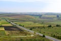 Road through agrarian fields Royalty Free Stock Photo