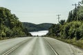 Road through Algonquin Provincial Park towatds lake beginning fall Ontario Canada Royalty Free Stock Photo