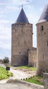 The road along the ancient fortress wall with towers