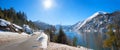 Road along lake achensee, snowy mountain Seebergspitze, tirolean alps in winter