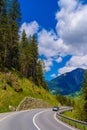 Road among Alps mountains, Klosters-Serneus, Davos, Graubuenden Switzerland Royalty Free Stock Photo