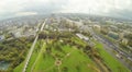 Road, aqueduct and park in city at cloudy day.