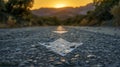 road with arrow on asphalt in sunset time, bokeh background. Royalty Free Stock Photo