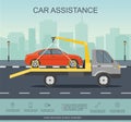 Road assistance. Car evacuator drive with red car on the road. Royalty Free Stock Photo