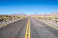 Road into the Atacama Desert. Barren rocky landscape, arid mountains and hills in the San Pedro de Atacama area. Royalty Free Stock Photo