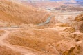 Road in the Atacama desert between salt formations at Valle de la Luna Royalty Free Stock Photo