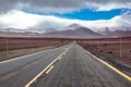 Road in Atacama desert savanna, mountains and volcano landscape, Chile, South America Royalty Free Stock Photo