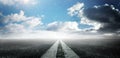 Road background. Close up view from asphalt level. Empty asphalt road and blue sky with white clouds. Road markings